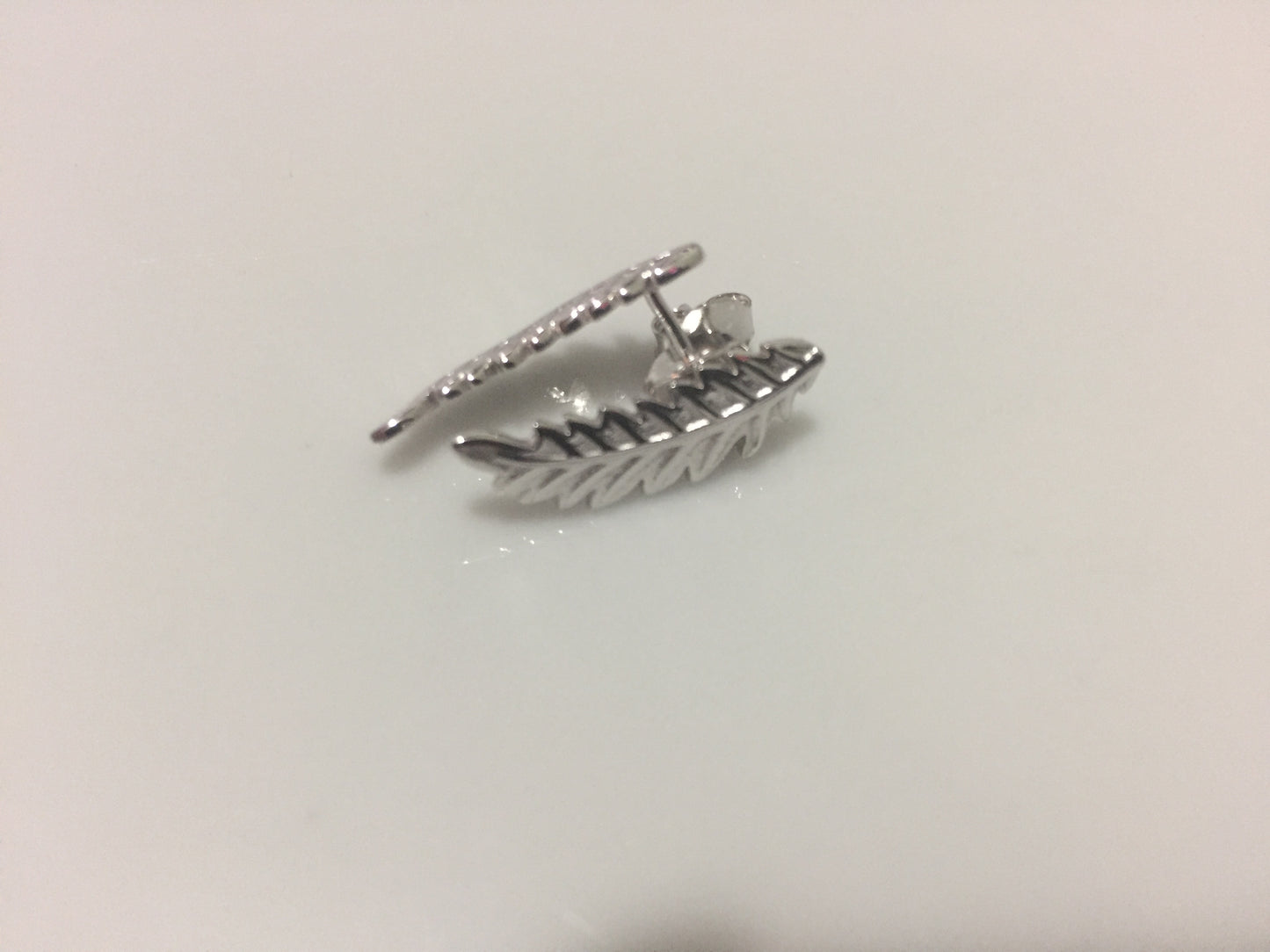 Feather studs