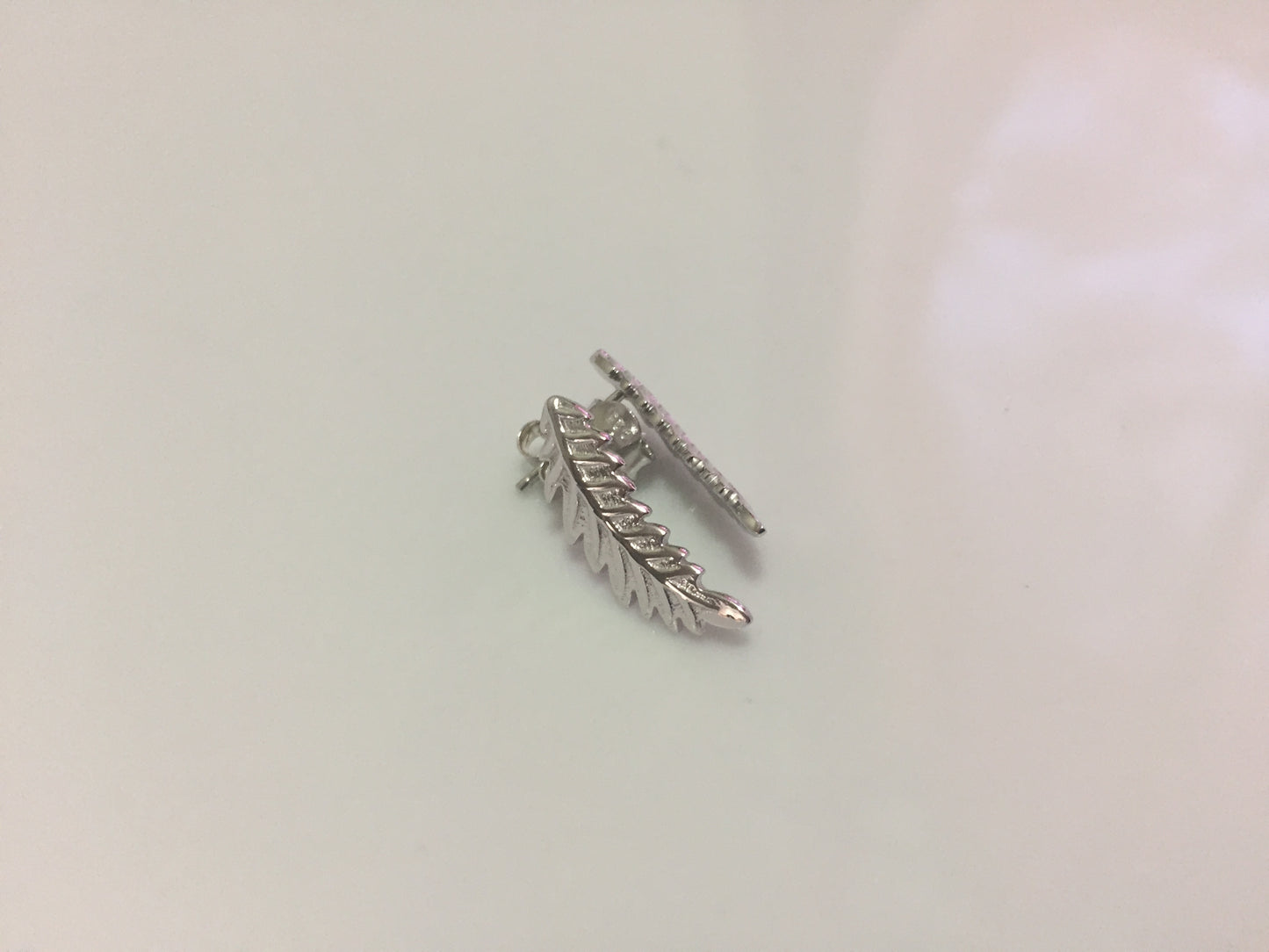 Feather studs