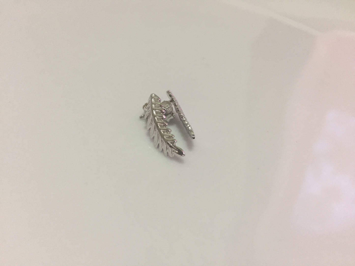 Feather studs