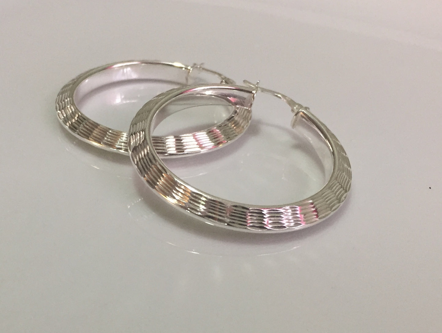 Large Diamond Cut Hoop Earrings