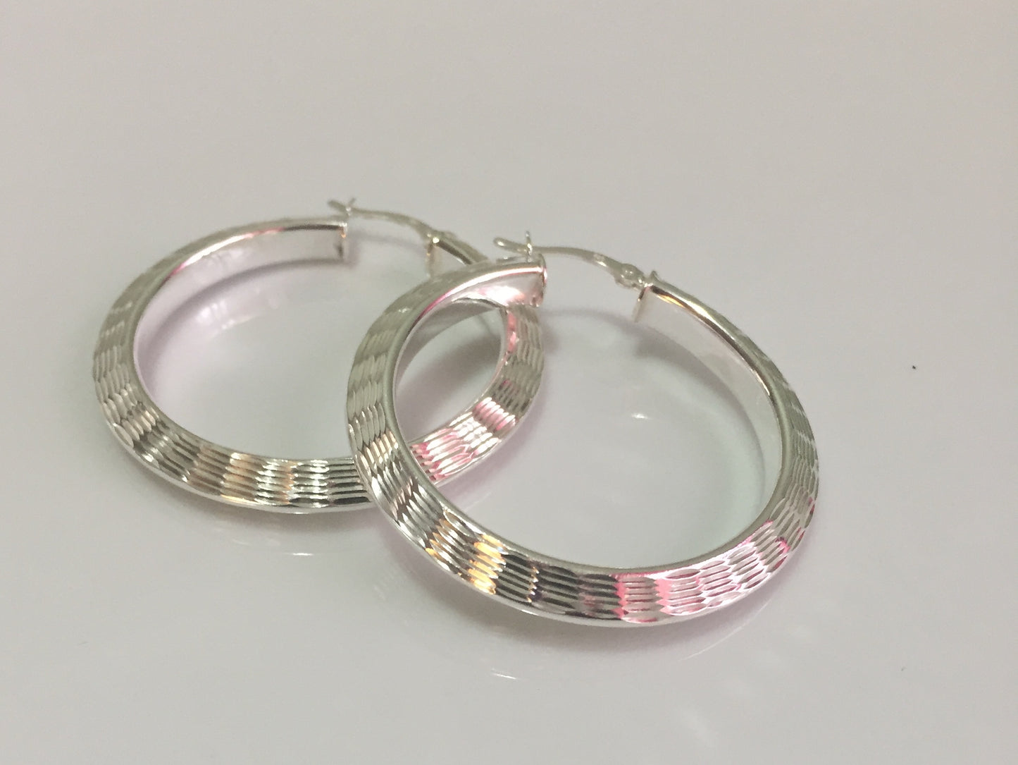 Large Diamond Cut Hoop Earrings
