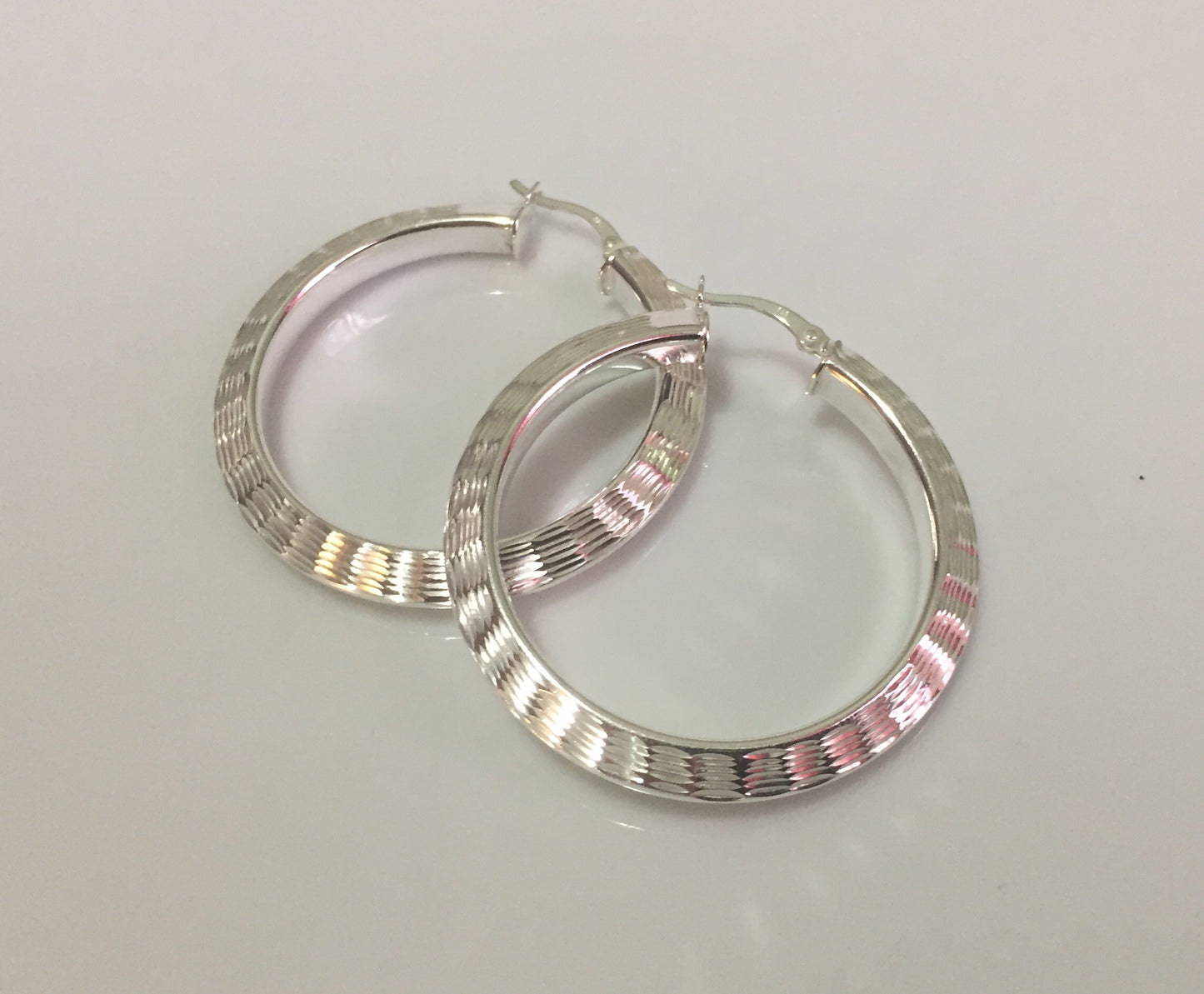 Large Diamond Cut Hoop Earrings