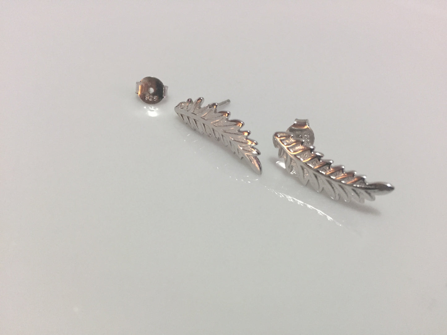 Feather studs