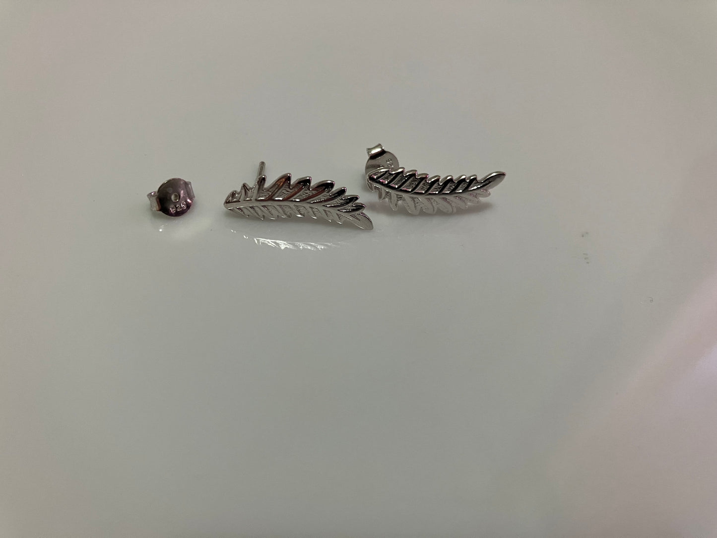 Feather studs